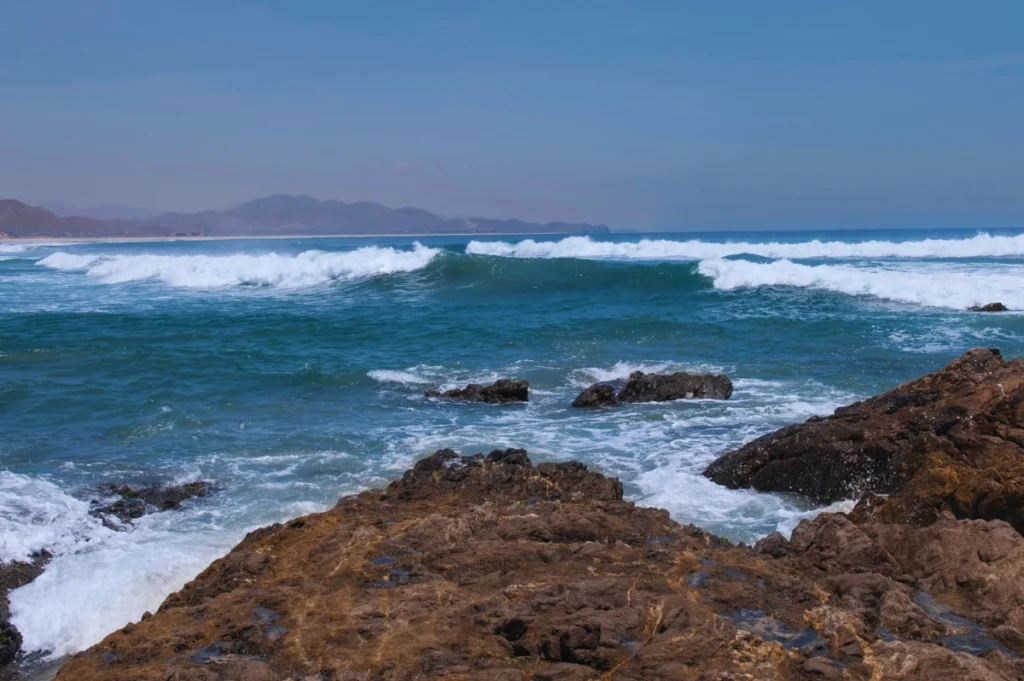 rocks-and-ocean-cerritos-beach-mexico -