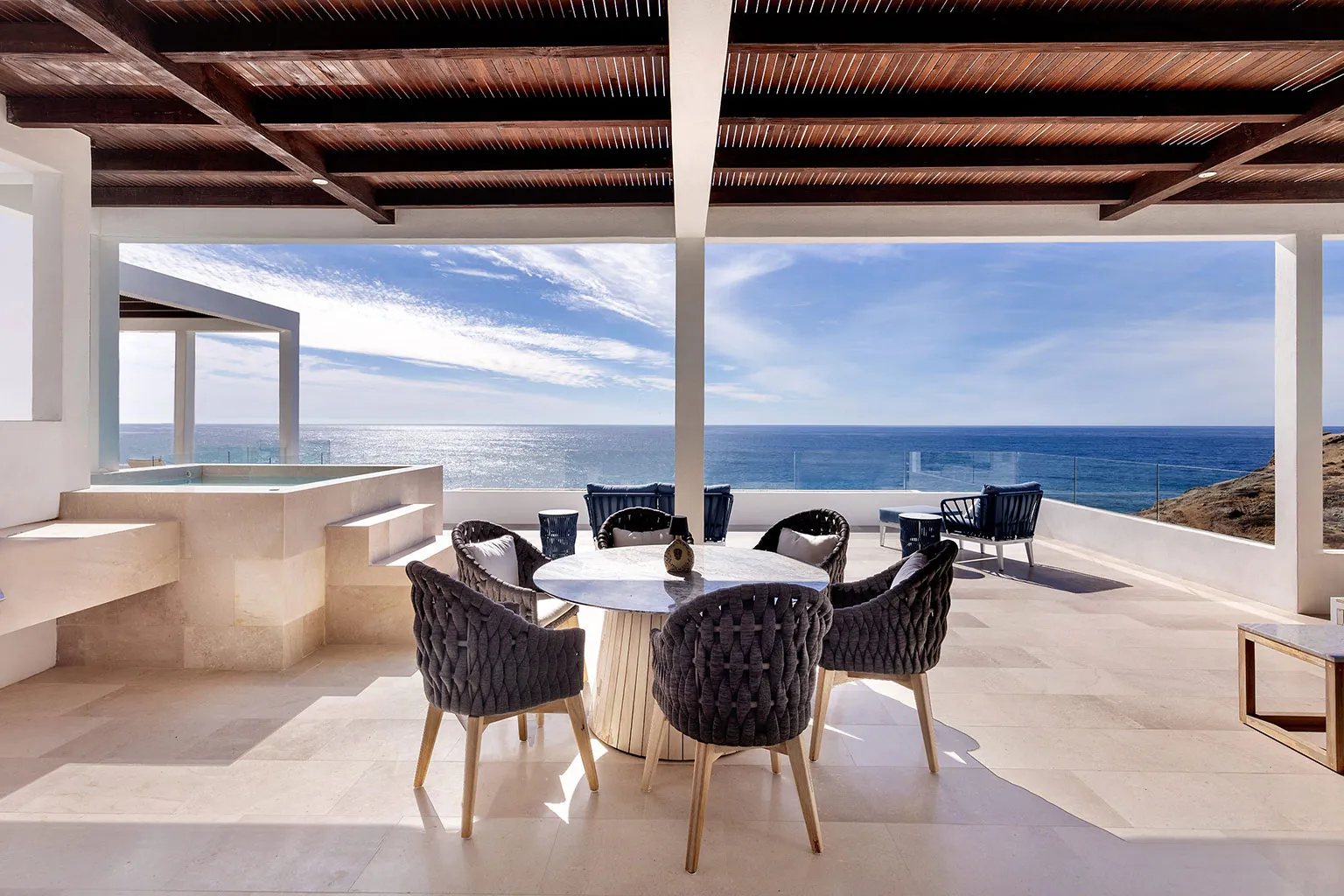 Ocean-View-Penthouse-Mexico-Stays-That-Deliver-02 - Ocean view penthouse terrace with outdoor dining and jacuzzi at The Cove at Cerritos, Baja California Sur